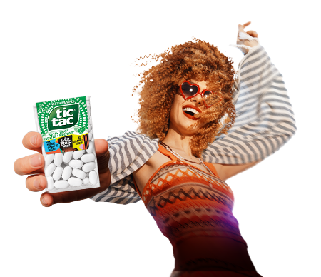 Woman holding Tic Tac® Lollapalooza pack.