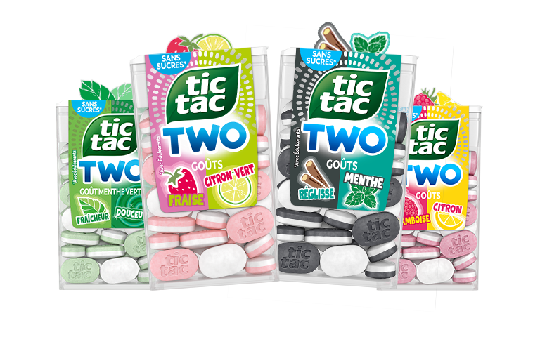 Assortiment de quatre paquets Tic Tac TWO aux saveurs fruitées et mentholées.