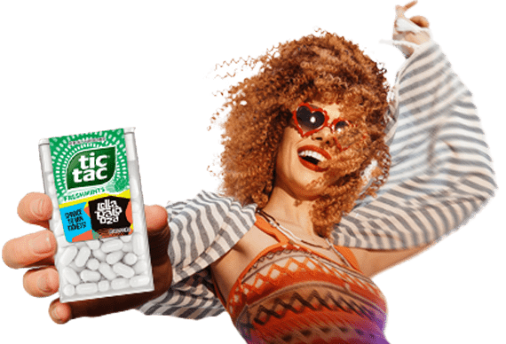 Woman holding Tic Tac® Lollapalooza pack.
